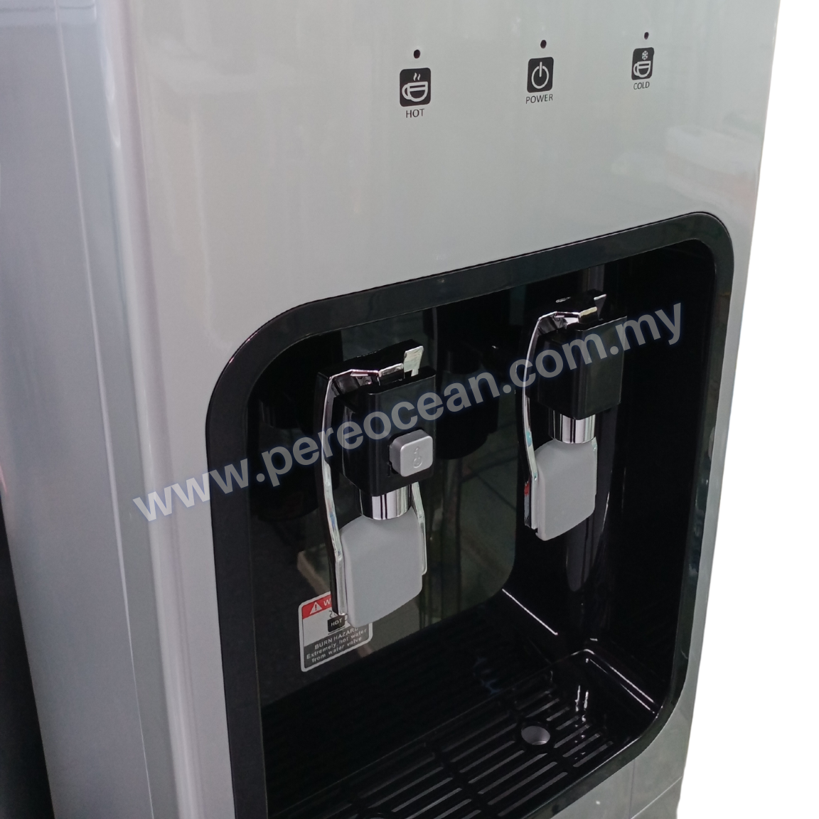 Picture of Closeup View of Hot Water Child Safety Lock of Pere Ocean Black Diamond Hot and Cold Bottom Load Bottled Water Dispenser